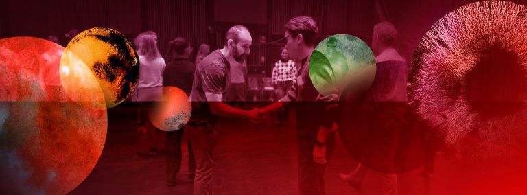 Workshop participants practising collaborative improvisation during a session on entrepreneurial decision-making under uncertainty